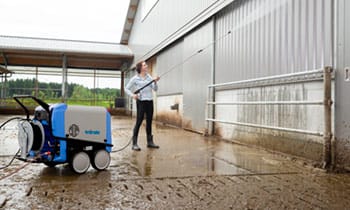 pressure washer in use at farm